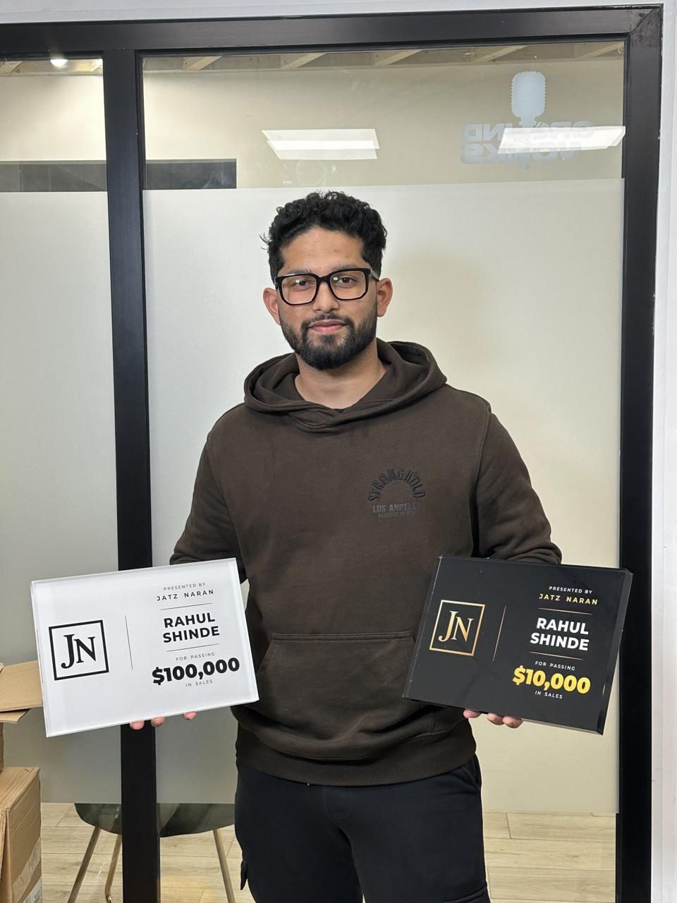 Rahul Shinde with his $10,000 and $100,000 sales awards
