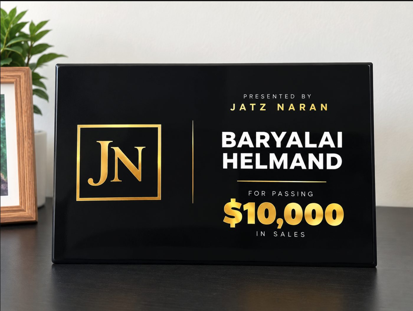 Baryalai Helmand's award for passing $10,000 in sales