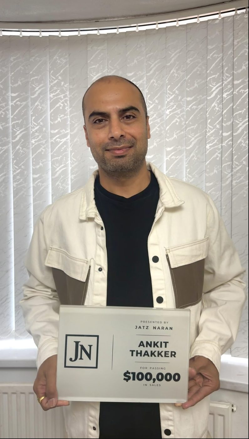 Ankit Thakker with his $100,000 sales award