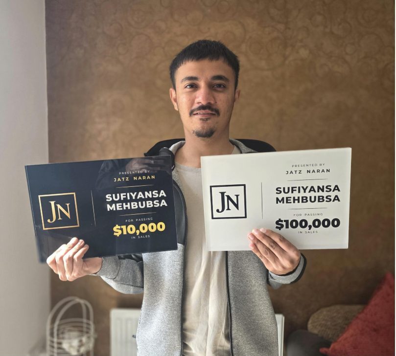 Sufiyansa Mehbubsa with his $10,000 and $100,000 sales awards